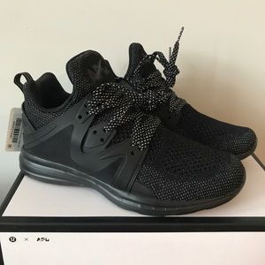 APL Women’s Ascend Sneakers In Black/Reflective!